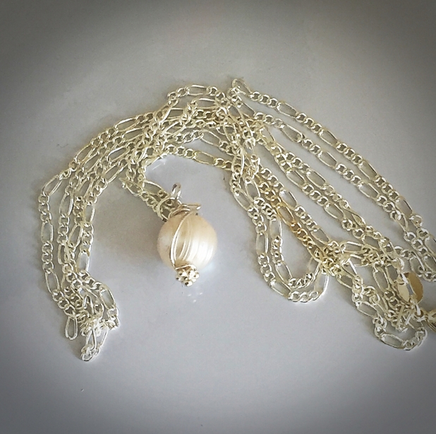 Sterling silver necklace with freshwater pearls and faux pearls in